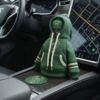Green Milwaukee Bucks mini hoodie covering a car's gear shift