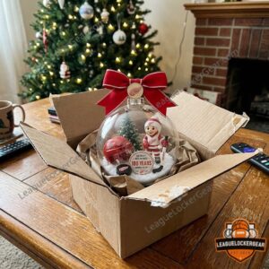 Detroit Red Wings 100 Years Anniversary 2026 Globe Ornament - close up of mascot figure and Christmas tree