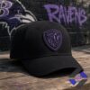 Baltimore Ravens Shield Logo Baseball Cap - front view against a brick wall