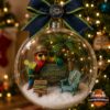 Jimmy Buffett Margaritaville globe ornament - front view with tropical parrot scene