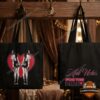 Kali Uchis For The Girls 2026 Tour Graphic Tote Bag - front and back designs hanging on wooden hooks