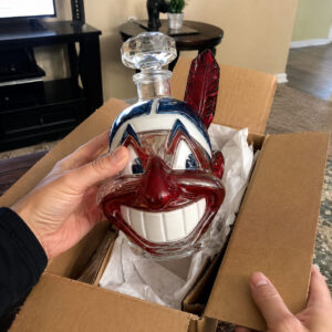Lets Go Tribe 125th Anniversary Chief Wahoo Whiskey Decanter 2026 - close-up showing the faceted stopper and