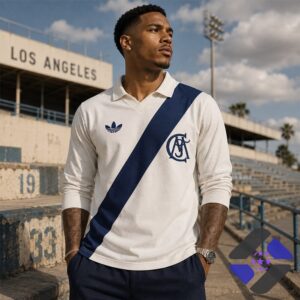 Detail of the stylized 'CMJ' monogram and diagonal stripe on the polo shirt