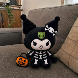 Sanrio Kuromi Halloween 2026 Skeleton Plush Toy - close-up of head with skull and crossbones