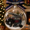 Top Gun 40th Anniversary Globe Ornament - front view with jet, helmet, sunglasses, and dog tags