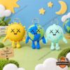 KAWS Universe Sun Earth Moon Plush Keychain - three character designs displayed together