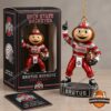 NCAA 2026 Ohio State Buckeyes Brutus Buckeye Ornament - boxed front view with mascot figurine displayed