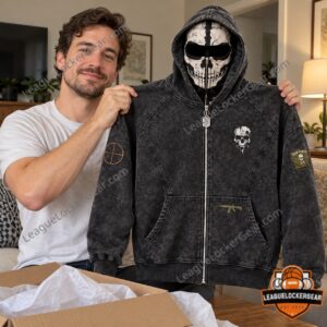 Man holding up the Bravo Six skull balaclava hoodie after unboxing