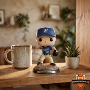 Misiorowski figure on a desk beside a coffee mug