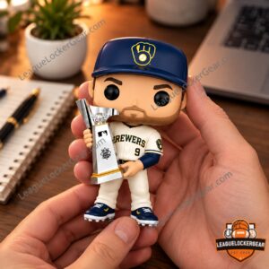 Hand holding the Jake Bauers figure in the white Brewers uniform