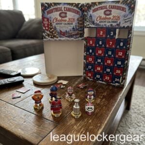 Montreal Canadiens Christmas 2026 Advent Calendar - opened box on a coffee table with Youppi! and a goalie