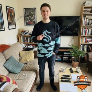 Man wearing the Kraken Naruto hockey jersey at home