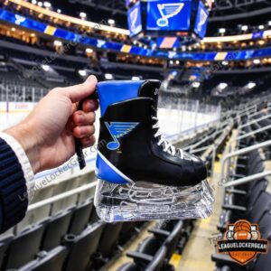 Hand holding the St. Louis Blues skate mug by its black handle in the stands