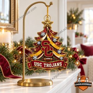 USC Trojans tree-shaped Christmas ornament hanging from a gold stand on a mantel